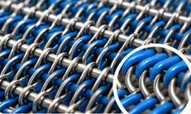 Close-up of interlinked spiral coils in a dryer fabric